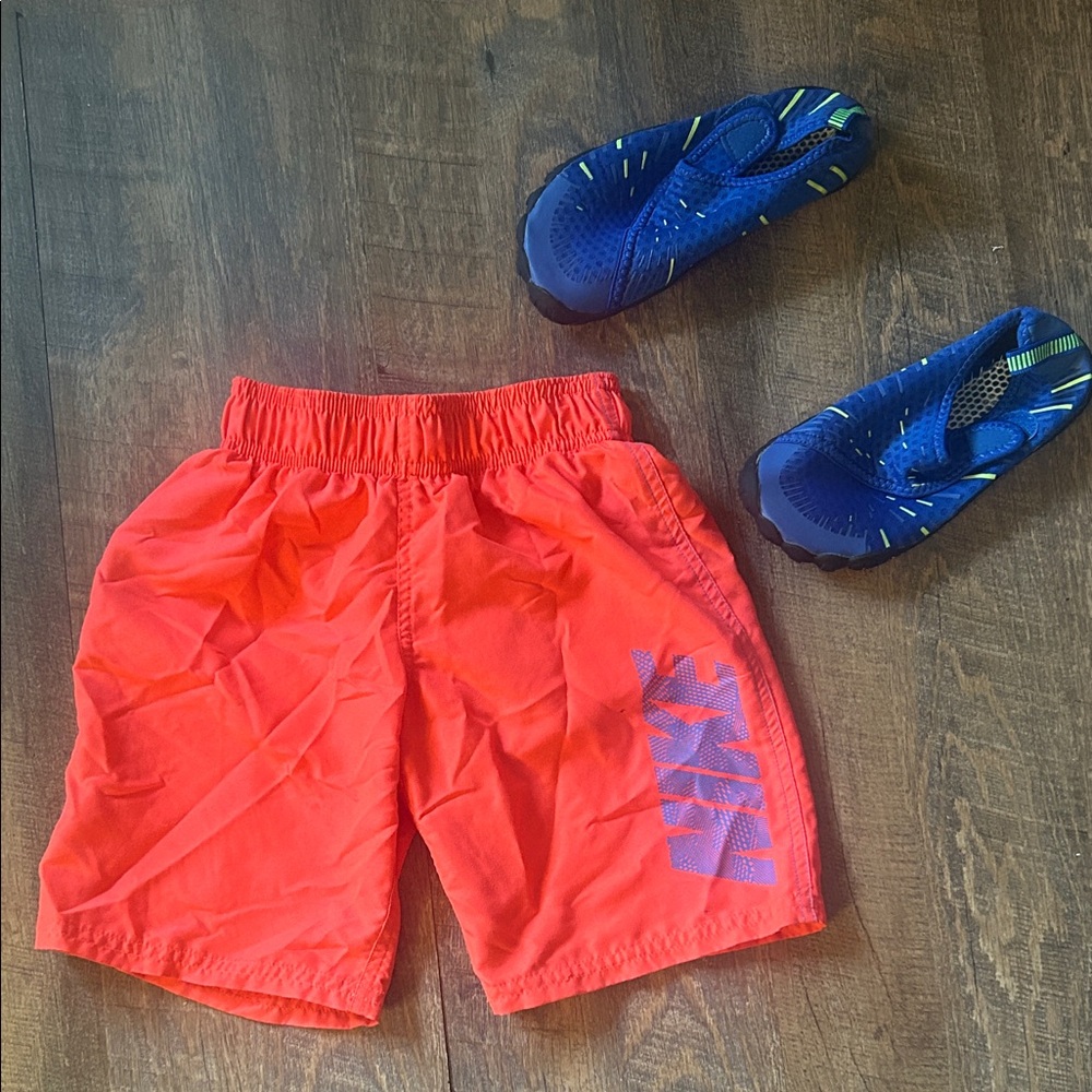 Nike swimming shorts and aqua shoes